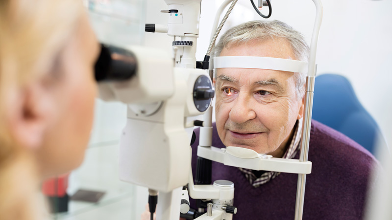 senior patient receiving eye exam